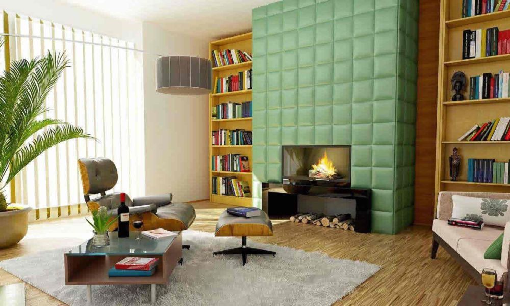 <span class="uk-h4">A living room with a green upholstered wall, a cozy fireplace, bookshelves, and modern furniture, creating a warm and stylish environment.</span>